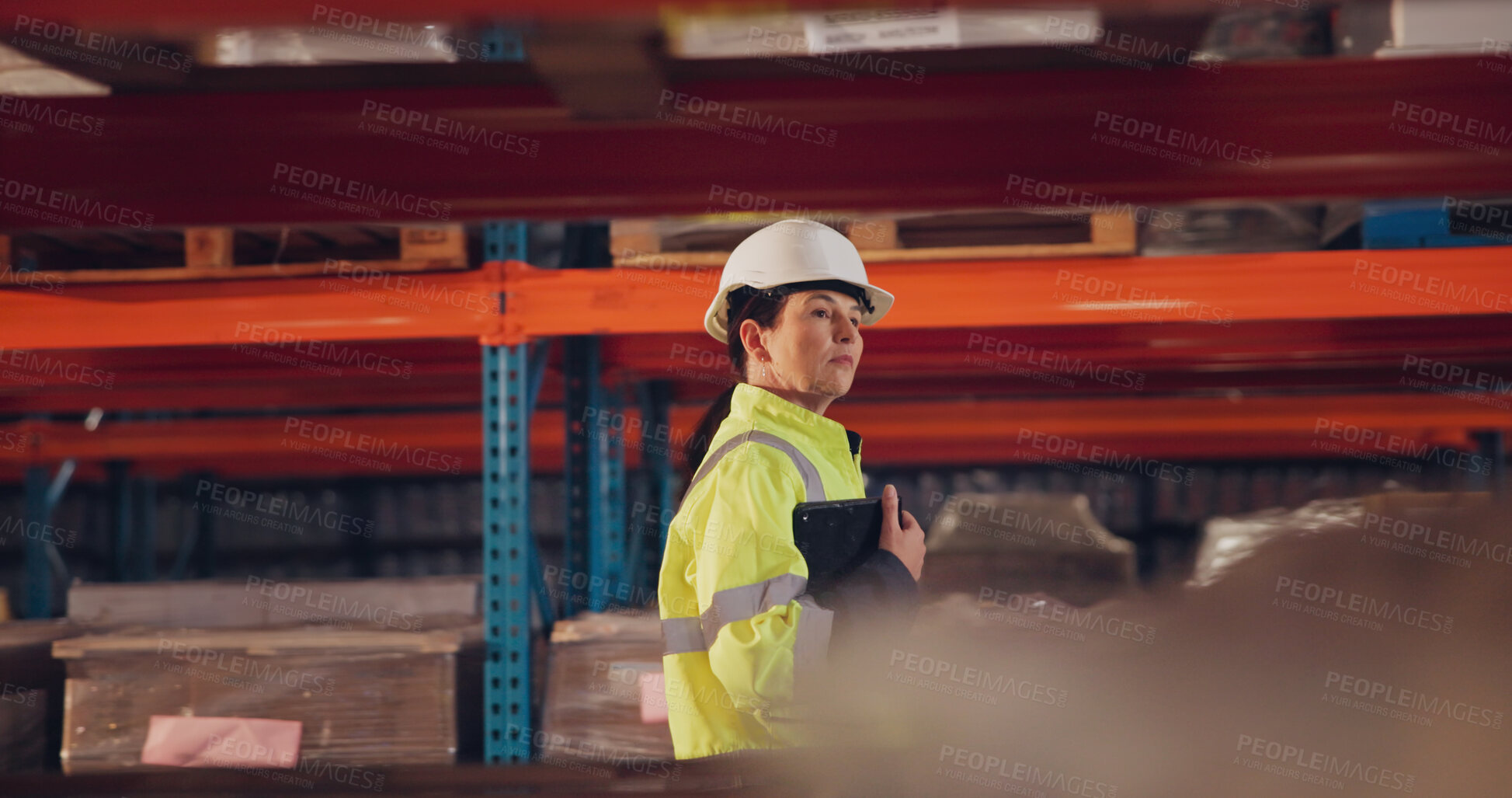 Buy stock photo Walking, tablet and woman in logistics, digital and inspection of stock in factory, website and checklist. Helmet, online and person with inventory of cargo, shipping and quality control in warehouse