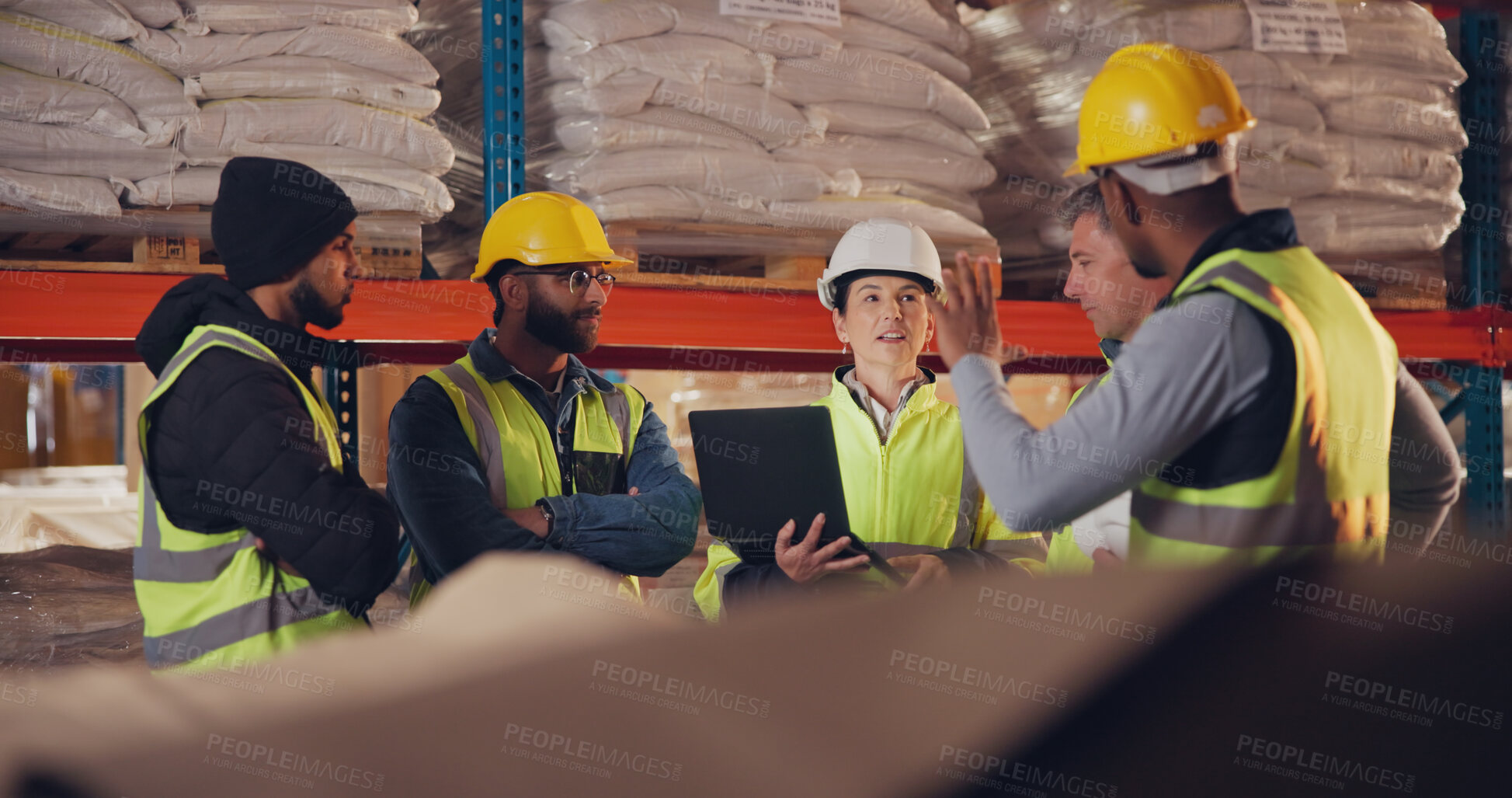 Buy stock photo Logistics, team and laptop in warehouse for meeting, inventory management and compliance training. Woman operations manager, group and tech in storage for safety information, question and feedback