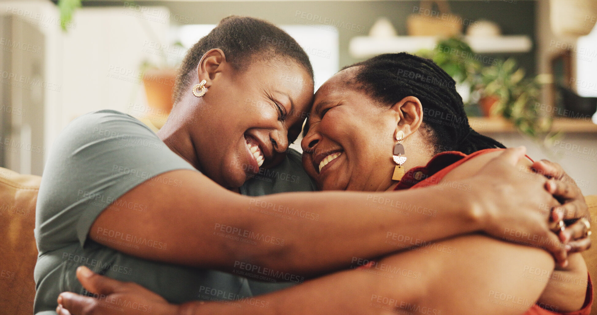 Buy stock photo Black family, touch forehead and women with hug for love, support and care on sofa. Elderly mother, daughter or embrace at home with smile, surprise visit or reunion on couch with happiness and trust