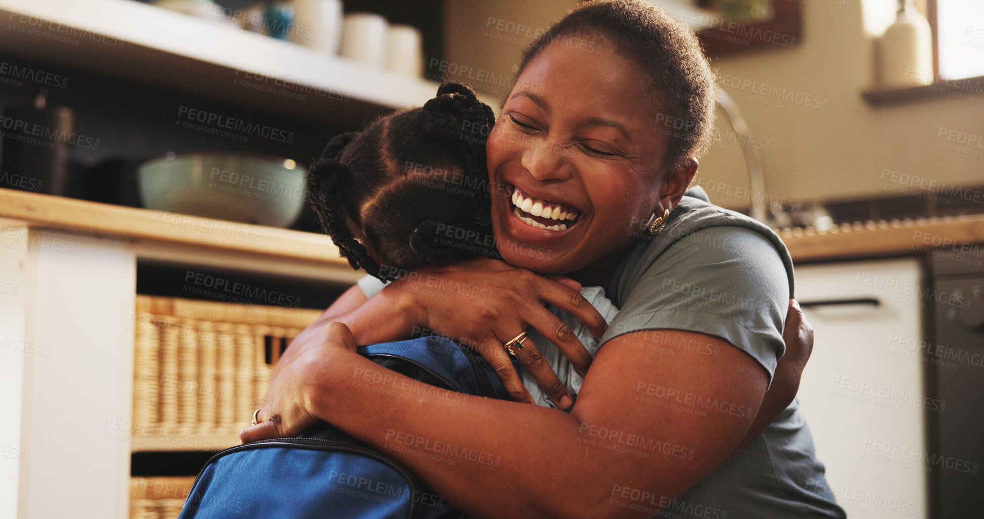 Buy stock photo Black woman, child and hug for school, education, morning and support for childhood development. Mother, daughter and smile with affection, embrace and love in kitchen or home for bonding as family