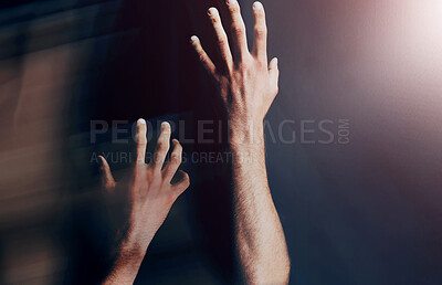 Buy stock photo Two arms isolated against a black background