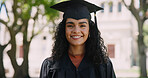 Education, girl and portrait outdoor at graduation for qualification, university success and ceremony. Graduate, student and happy with diploma, scholarship award and academic achievement on campus