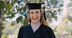 Education, woman and portrait outdoor at graduation for qualification, university success and ceremony. Graduate, student and happy with milestone, scholarship award or academic achievement on campus