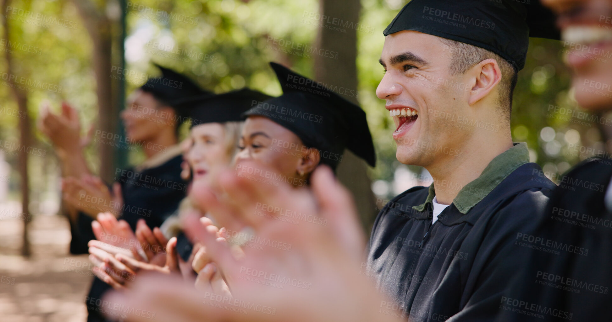 Buy stock photo Education, man and students clapping hands at graduation for academic milestone and achievement. University graduate, applause and support at outdoor ceremony for success, college diploma and degree
