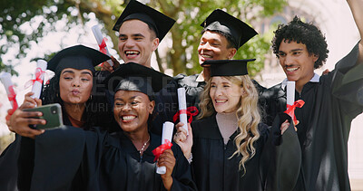 Buy stock photo Graduation, students and happy selfie with diploma at outdoor ceremony for social media post or profile picture. Education, diversity friends and group with certificate for celebration and milestone