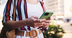 Hands, phone and typing outdoor for social media, communication and travel while chatting with chat. Female person, smartphone and walking in city for networking, email and mobile app with message