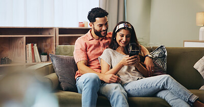 Buy stock photo Relax, happy and couple on sofa with phone for bonding, loving relationship and online together in home. Love, apartment and man and woman embrace on smartphone for social media, website and internet