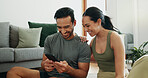 Relax, phone and happy couple in home for social media, online shopping and payment on app. Man, woman and mobile in living room for conversation, account review and check credit score on internet