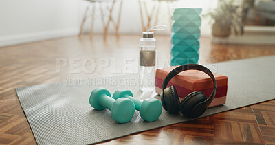 Buy stock photo Headphones, mat and dumbbells with water bottle of fitness equipment or interior on floor at home. Empty room or space with headset, weights or liquid for health, wellness or tools for exercise