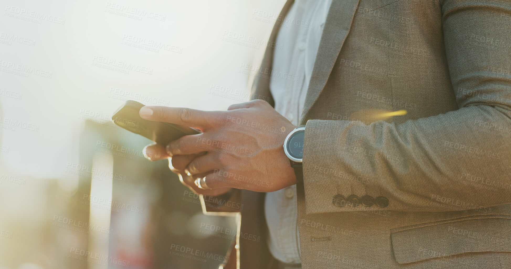 Buy stock photo Man, phone and hands in city for commute, travel and public transport schedule. Business person, mobile and typing on street for online taxi service, location update and ready for work in New York