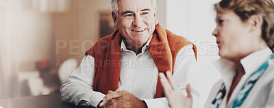 Buy stock photo A senior man and his wife filling out forms at a hotel reception desk