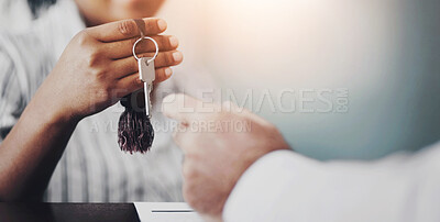 Buy stock photo Closeup of a receptionist handing over the hotel room keys to a senior patron