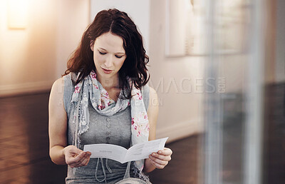 Buy stock photo Museum, woman and reading brochure at gallery for creative artwork, culture and history. Paper, exhibition and female person with guide, tourist information and visitor at expo for learning heritage