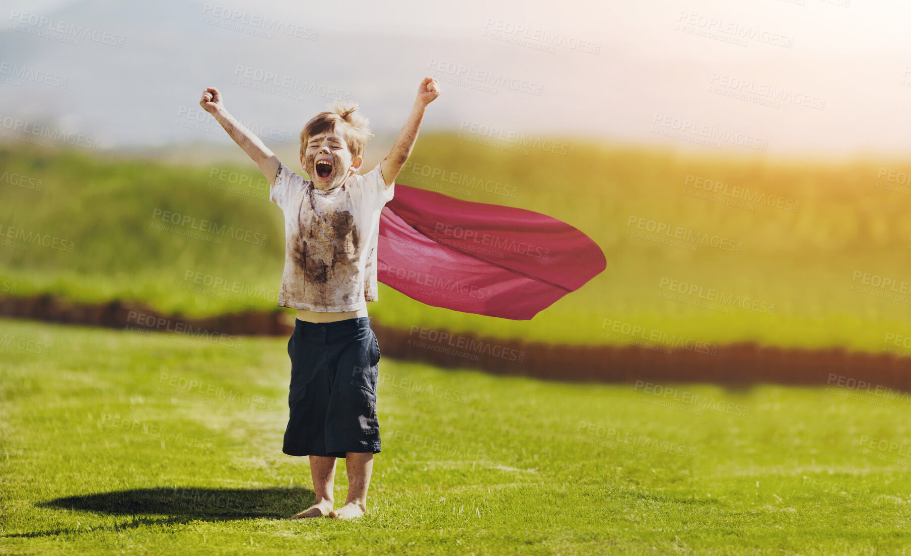 Buy stock photo Cute little boy cheering while standing outdoors