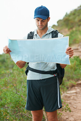 Buy stock photo Man, hiking and map for direction, nature and guide on trail, fitness and exercise on holiday. Male person, lost and documents for information, travel and journey or adventure to forest for cardio