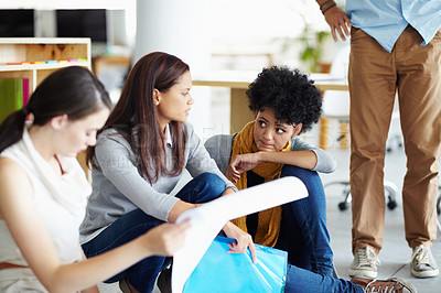 Buy stock photo People, meeting and discussion on floor with documents, diversity or feedback for poster at marketing company. Women, startup and team talk for review, decision and graphic design at creative agency