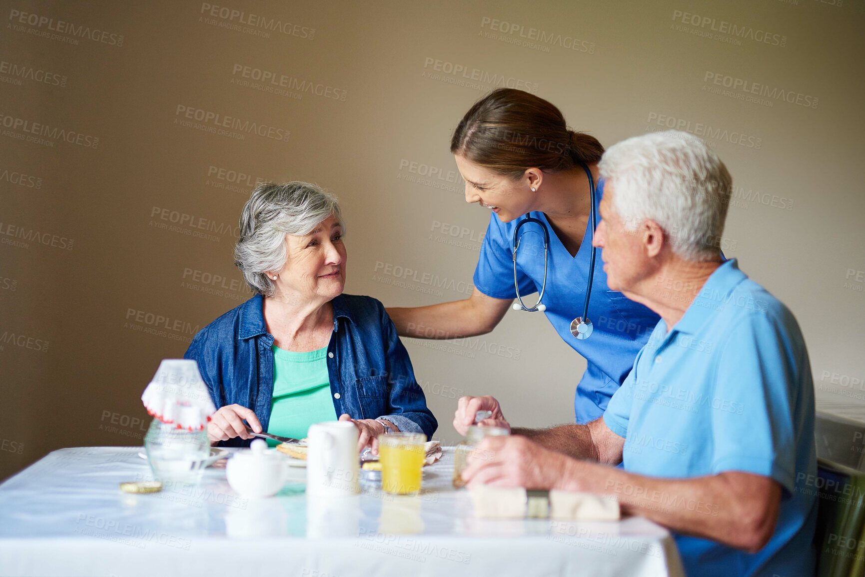 Buy stock photo Breakfast, nurse and old couple in dining room of retirement home for assisted living together. Food, happy or smile with caregiver, senior man and woman in apartment for diet, health or nutrition