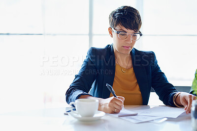 Buy stock photo Receptionist, business woman and writing notes in office for schedule update or appointment booking. Pen, serious secretary or notepad for planning, info or to do list for administration task at work