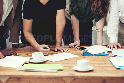 Buy stock photo Cropped shot of a group of businesspeople having a meeting in an office