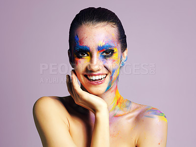 Buy stock photo Portrait, girl and colorful makeup for beauty or cosmetics with laughing on studio background. Female person, cosmetology and creativity by artist with face paint for aesthetic, art and wellness