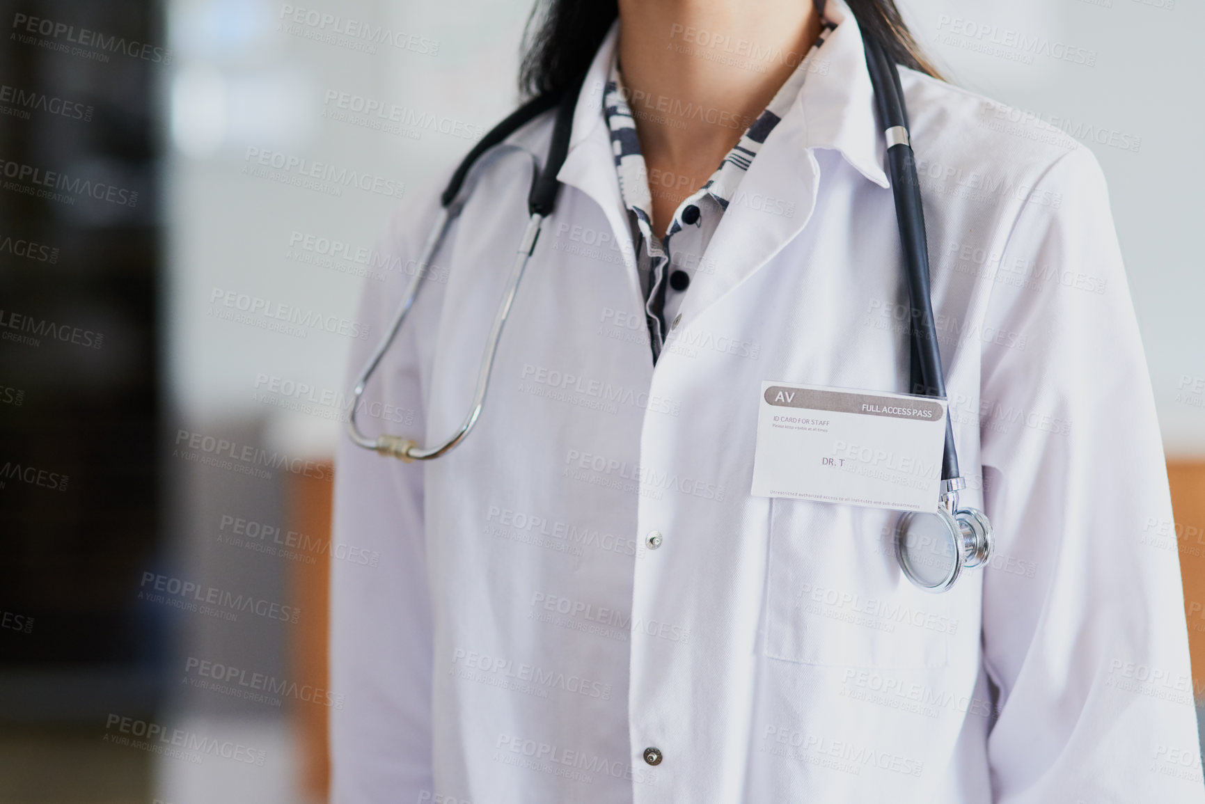 Buy stock photo Doctor, badge and closeup in office for healthcare, confidence and medical services with medicine. Woman, job and staff in hospital for health, wellness and cardiology with name tag and stethoscope