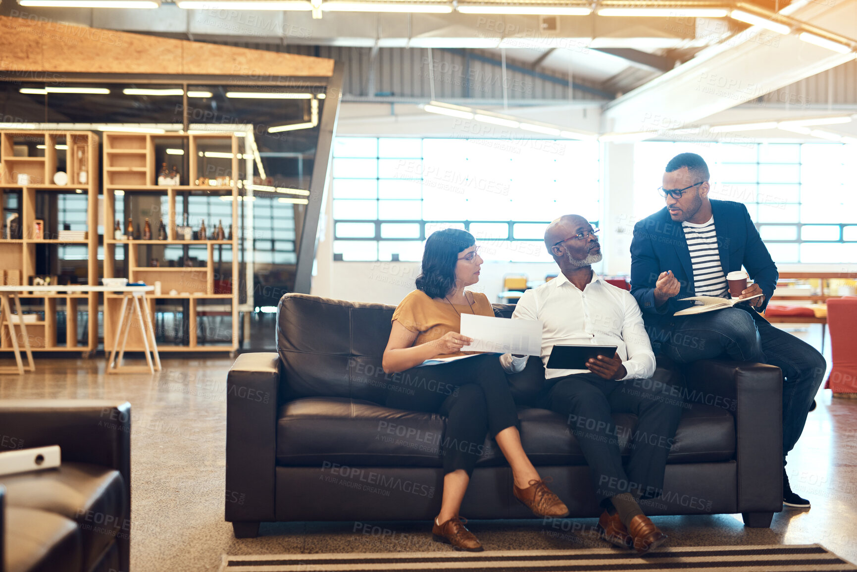 Buy stock photo Full length shot of a group of designers having a discussion in an office