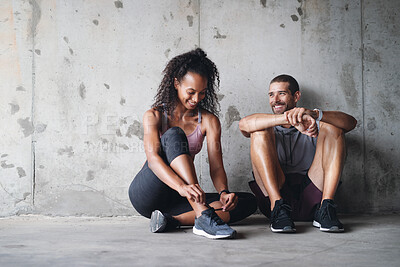 Buy stock photo Couple, sneakers and tie lace outdoor for fitness, wellness and accountability as relationship goals. Man, woman and workout by bridge with teamwork, exercise and cardio together for body health