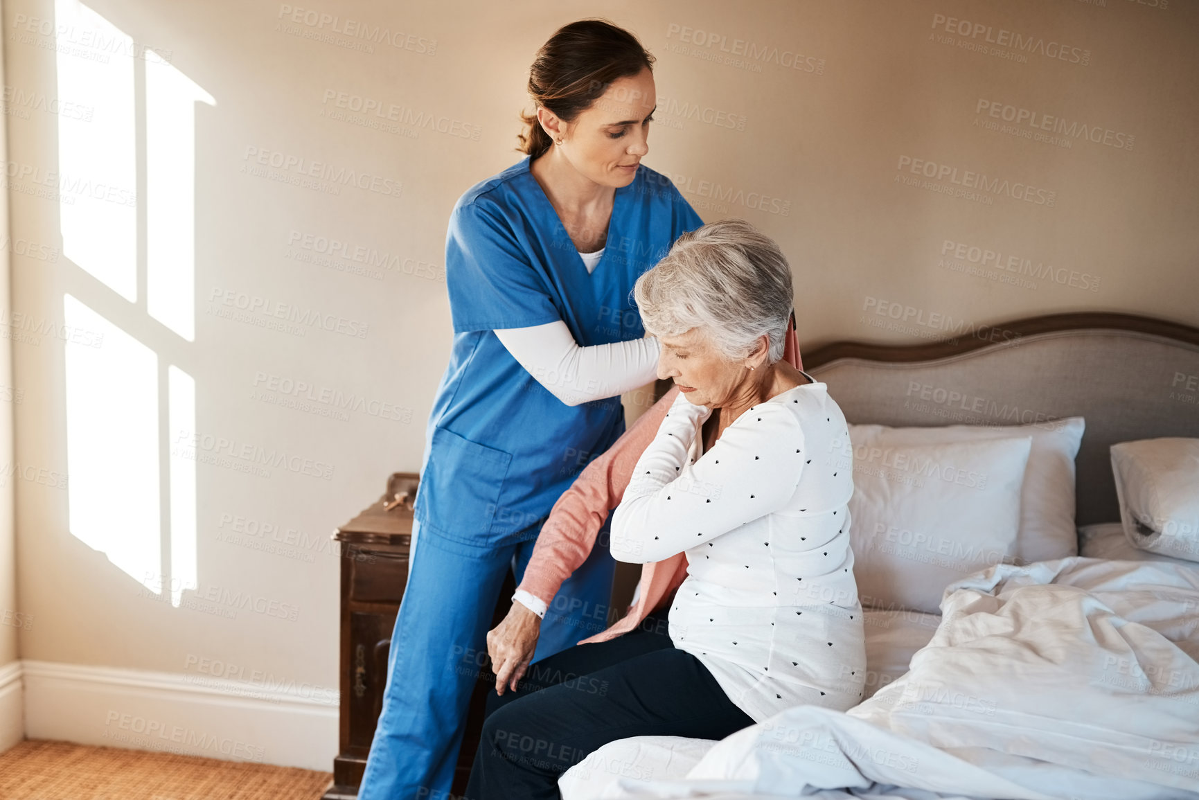 Buy stock photo Nurse, senior woman and dressing in bedroom, support and trust with rehabilitation, recovery and healing. House, medical and professional with patient, caregiver and health with comfort or assistance