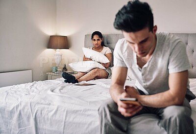 Buy stock photo Couple, woman and cheating with phone on bed for toxic relationship, infidelity and sneaky text message. Ignore, person and affair on smartphone with conflict in marriage, fighting and jealous wife