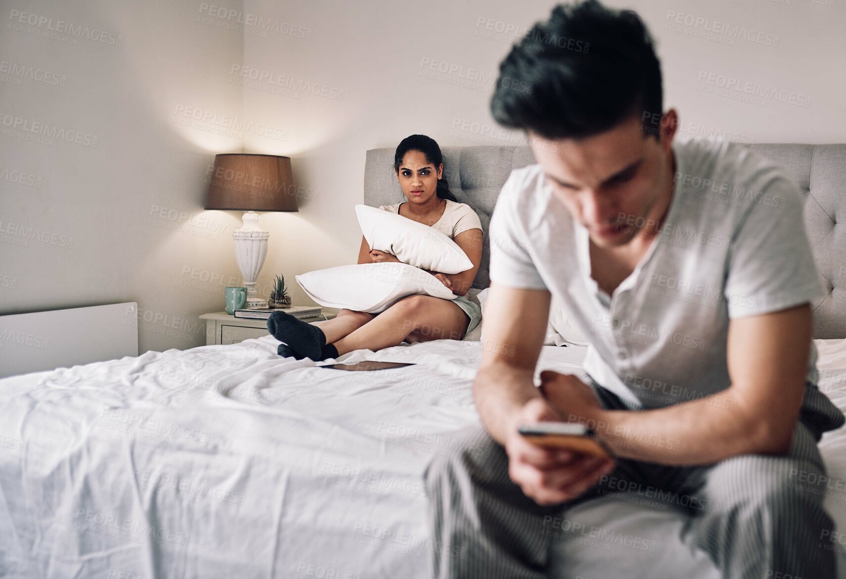 Buy stock photo Couple, woman and cheating with phone on bed for toxic relationship, infidelity and sneaky text message. Ignore, person and affair on smartphone with conflict in marriage, fighting and jealous wife