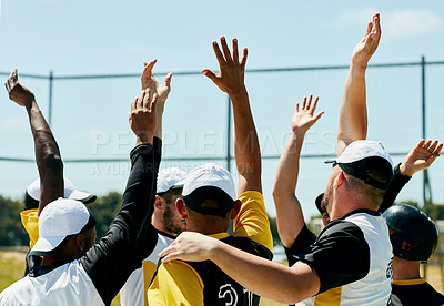 Buy stock photo Cropped shot of a team of young baseball players cheering with their arms raised while standing on the field during the day