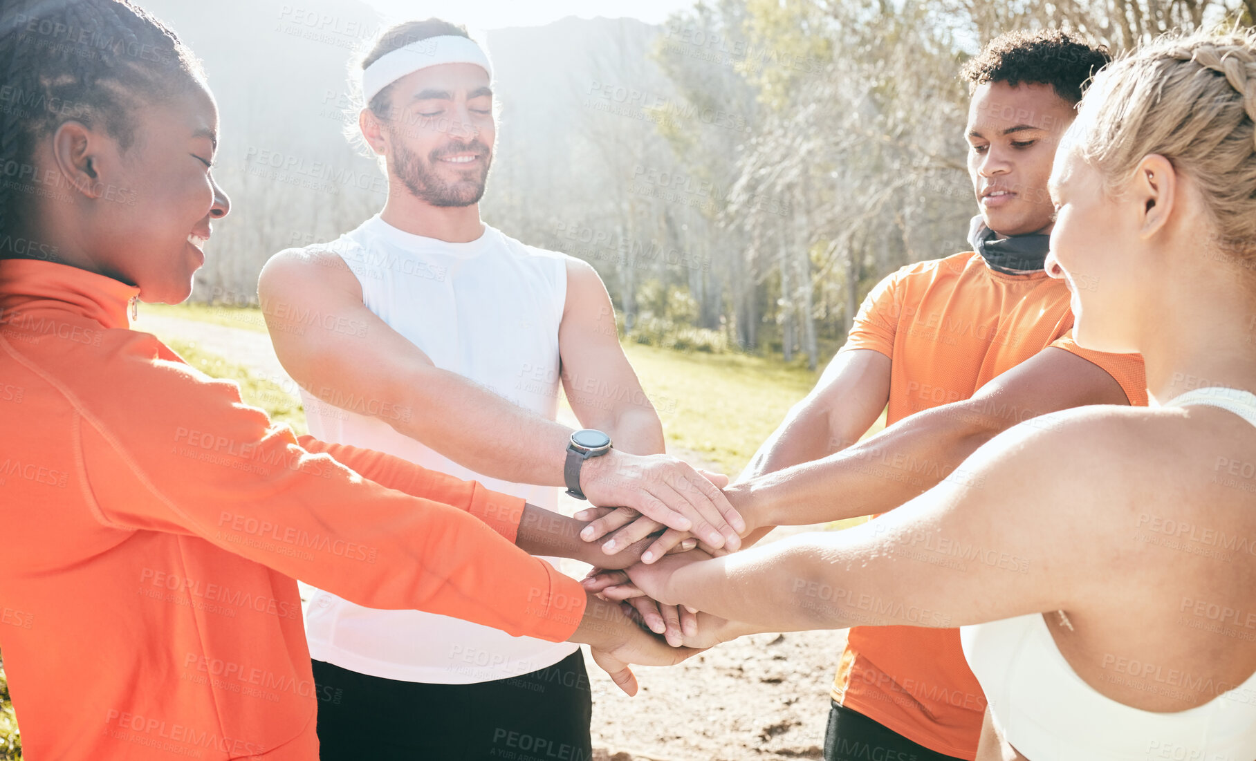 Buy stock photo Outdoor, stack and hands of friends for fitness, celebration and achievement for training goals. Nature, men and women with huddle for success, teamwork and support for wellness exercise with win