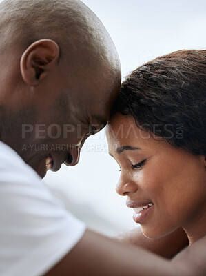 Buy stock photo Outdoor, black couple and forehead touch with smile in love for support, care and bonding. People, relationship and outside with trust for solidarity, respect and comfort as lovers in closeup