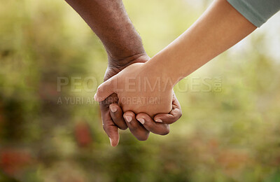 Buy stock photo Outside, couple and holding hands in unity with love for support, care and bonding. People, relationship and back in outdoor in trust for solidarity, respect and comfort as lovers together in closeup