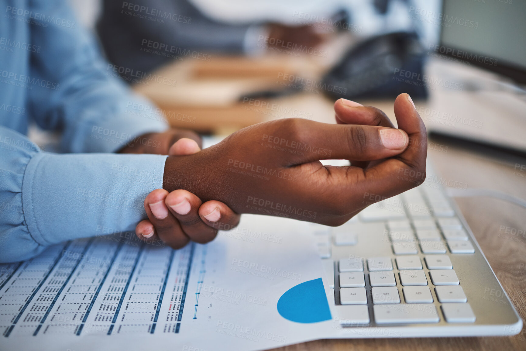 Buy stock photo Person, hands and wrist pain with injury for carpal tunnel syndrome, ache or cramp on office desk. Closeup, employee or typist with sore arm from strain, pressure or overworked muscle at workplace
