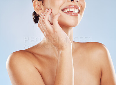 Buy stock photo Smile, skincare and body of model in studio for beauty and treatment for natural glow, shine or wellness. Happy, touching and woman with grooming routine for cosmetics or health by blue background