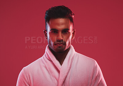 Buy stock photo Hygiene, beauty and face portrait of man with bathrobe for body shower and cleaning on studio background. Confidence, luxury and spa treatment with aesthetic muslim man for self care grooming routine