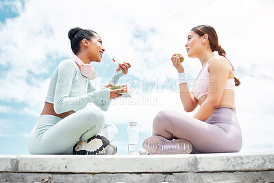 Buy stock photo Salad, apple and fitness friends eating food outdoor for wellness, diet and vegan lifestyle with blue sky clouds mock up. Women or people with green fruits and vegetables lunch after an exercise