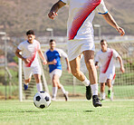 Soccer, team and running in sports game, fitness or exercise with the ball on the field in the outdoors. Group of football players on the attack for goal, score or match point on the soccer field