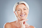 Beauty, skincare and elderly woman from Germany happy about healthy skin and wellness. Cosmetic, happiness and senior person holding her face after a facial, change or dermatology spa treatment