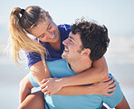 Happy, couple and piggy back of people with love, care and vacation joy together with a smile. Girlfriend and boyfriend hug at the beach on a travel trip with a content, happiness and care feeling