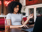 Woman, laptop and credit card for banking payment in a cafe or restaurant with fintech. Pc, coffee shop and female paying for ecommerce online shopping order while buying with a debit card