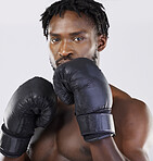 Boxing gloves, strong man and fitness portrait to fight for sports training and workout in studio. Athlete boxer person ready for exercise, performance and mma competition with power and energy