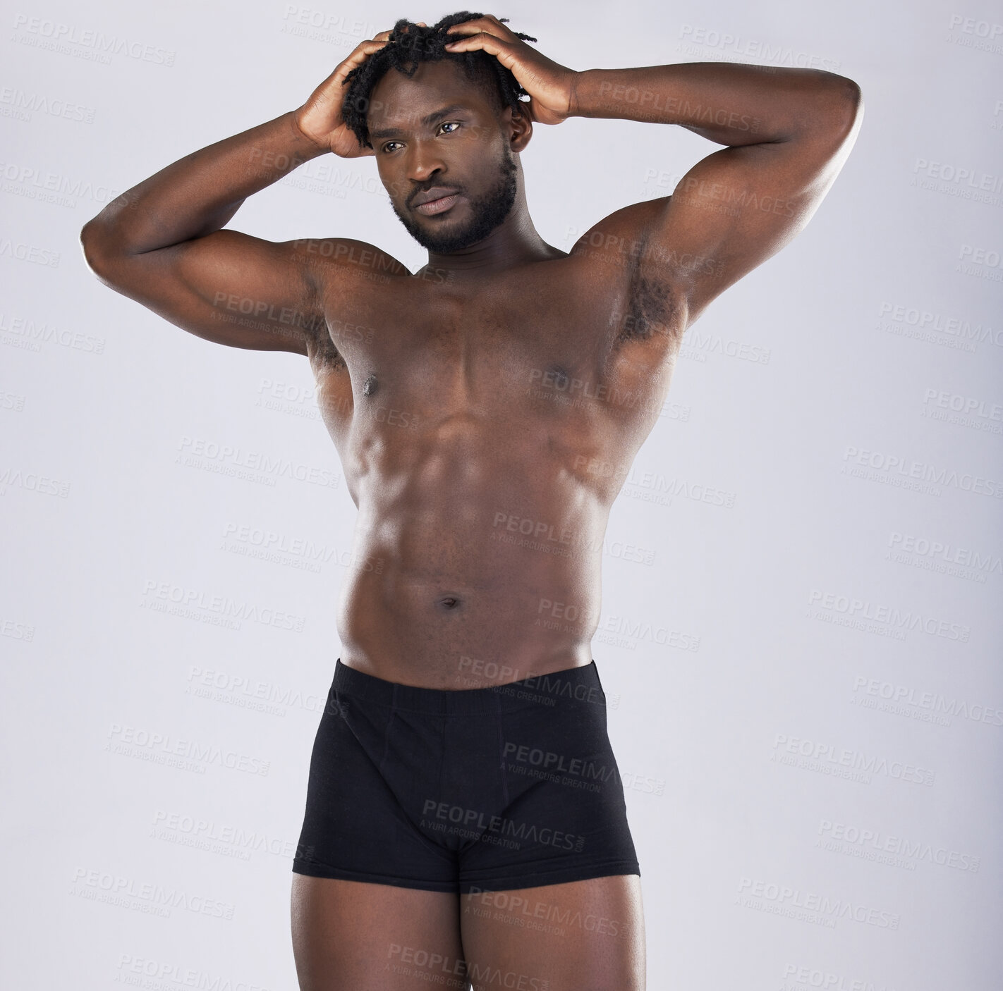 Buy stock photo Sports person, fitness and body of black man in studio for strong muscle and power. Health and wellness of a sexy male bodybuilder model in underwear with growth after exercise, workout and training