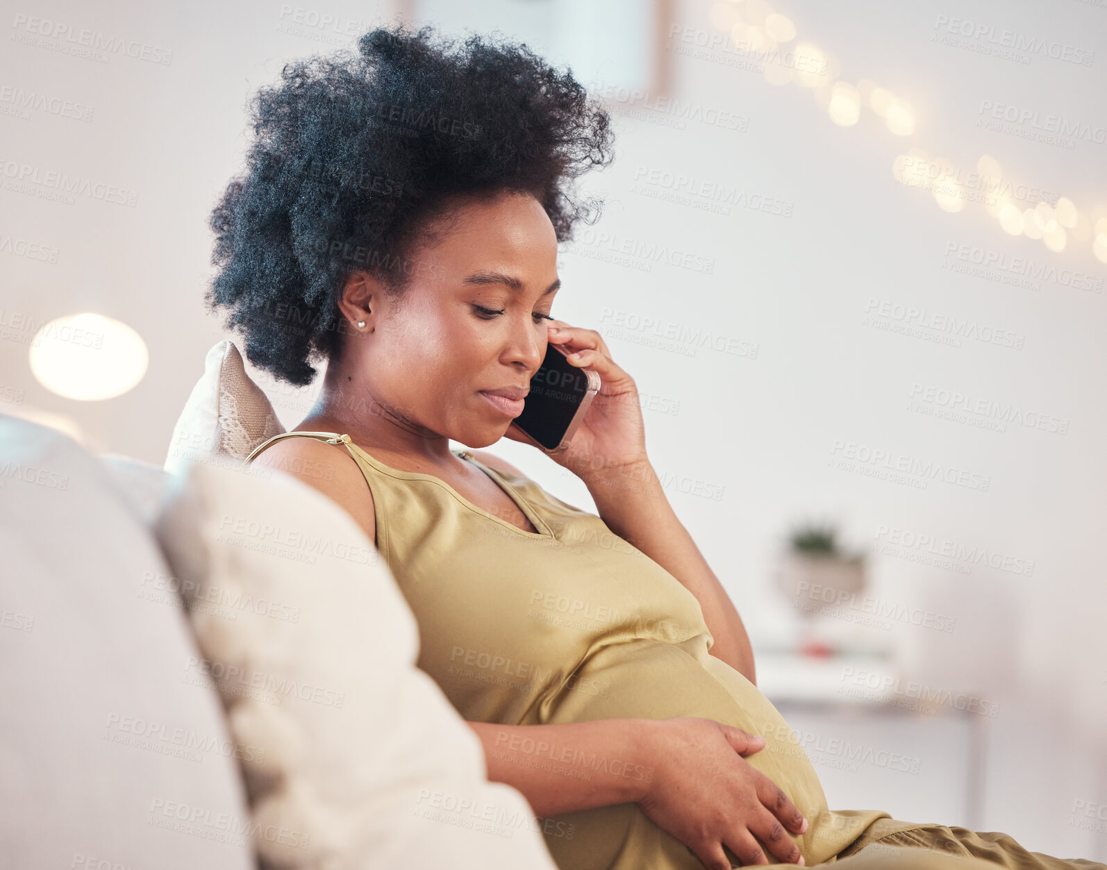 Buy stock photo Pregnant, phone call and black woman in home, talking or chatting to contact on living room sofa. Technology, pregnancy or future mom with mobile smartphone for networking, conversation or discussion