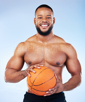 Buy stock photo Basketball player, black man and studio portrait with smile, shirtless or happy for sports by blue background. Young fitness expert, body wellness or ball in hands for development, sport and games