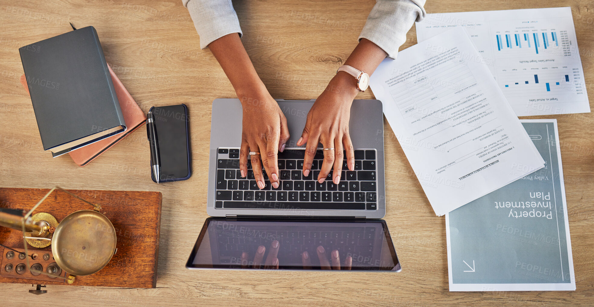 Buy stock photo Lawyer, hands and laptop typing with divorce case and notes with website in a office. Desk, top view and law firm with planning paperwork for settlement report with contract document with computer