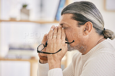 Buy stock photo Frustrated senior man, headache and stress in debt, burnout or financial crisis at home. Mature male person with migraine, eye strain or anxiety in depression, mental health or pain or overworked