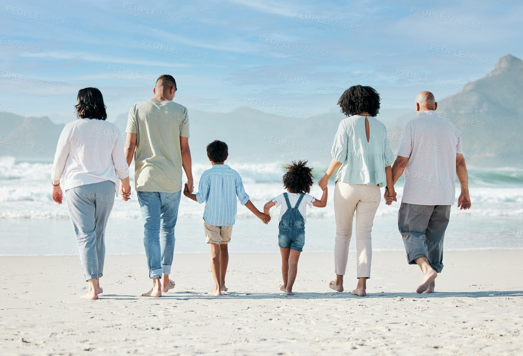 Buy stock photo Back, beach and family holding hands, vacation and summer break with bonding, ocean and travel. People, grandparents and mother with father, children and love with seaside holiday, care and adventure