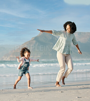 Buy stock photo Mom, child and playing on beach, running together in summer waves on tropical island holiday in Hawaii. Fun, mother and daughter on ocean vacation with airplane games to relax in water with blue sky.